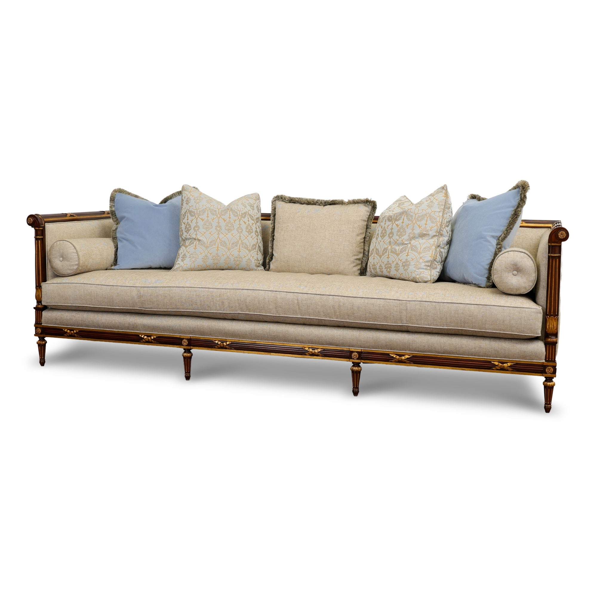 Beige sofa with decorative pillows on a white background